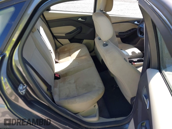 2018 Ford Focus SE z VIN 1FADP3FE1JL238012, wystawiony jako IAAI lot #42185232 z przebiegiem 143 687 mil mil oraz . Historia ofert i sprzedaży dostępna na DreamBid. Obrazek 8.