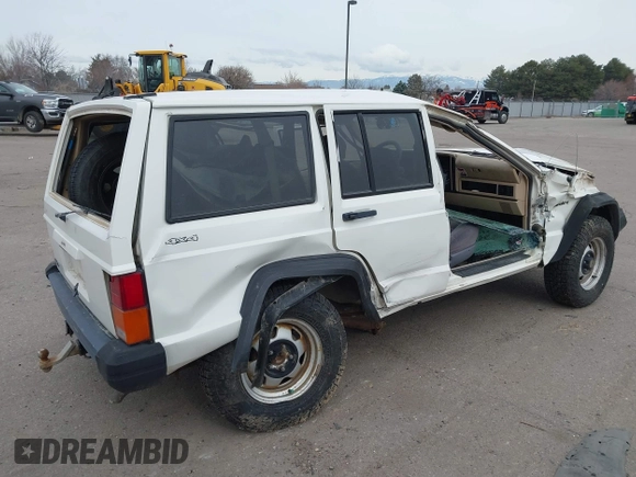 1996 Jeep Cherokee SE with VIN 1J4FJ28S6TL230275, listed as a IAAI auction lot 41731116 with 172,361 mi miles and . Bid and sale history available at DreamBid. Image 4.