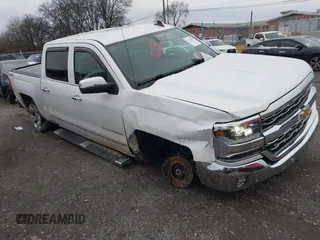 2018 Chevrolet Silverado 1500 LTZ with VIN 3GCUKSECXJG327822, listed as a IAAI auction lot 41258229 with 81,553 mi miles. Bid and sale history available at carsss.com. Image 1.