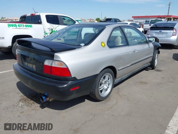 1996 Honda Accord LX with VIN 1HGCD7235TA023971, listed as a IAAI auction lot 42152007 with 183,536 mi miles and . Bid and sale history available at carsss.com. Image 4.