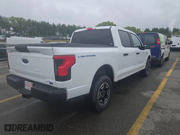2023 Ford F-150 Lightning Pro z VIN 1FTVW1EL0PWG02840, wystawiony jako IAAI lot #42379448 z przebiegiem 52 710 mil mil oraz . Historia ofert i sprzedaży dostępna na DreamBid. Obrazek 41.