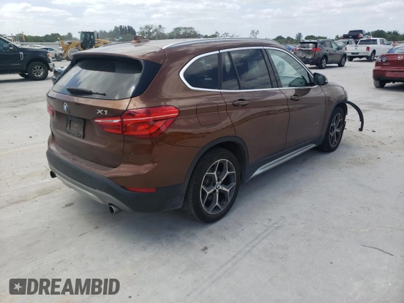 2016 BMW X1 xDrive28i with VIN WBXHT3C31GP880132, listed as a Copart auction lot 69129132 with 74,759 mi miles. Bid and sale history available at carsss.com. Image 4.