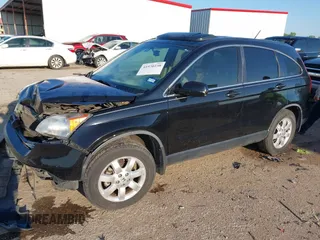 2007 Honda CR-V EX-L with VIN JHLRE38717C069853, listed as a IAAI auction lot 41970238 with 138,010 mi miles and . Bid and sale history available at carsss.com. Image 2.