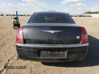 2006 Chrysler 300 C with VIN 2C3KA63H06H272552, listed as a Copart auction lot 72185684 with 105,737 mi miles and Salvage Title. Bid and sale history available at carsss.com. Image 6.