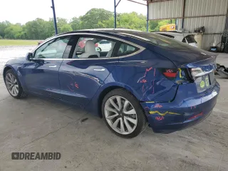 2019 Tesla Model 3 Mid Range z VIN 5YJ3E1EA1KF417900, wystawiony jako Copart lot #55310265 z przebiegiem 45 739 mil mil oraz Szkoda całkowita • Salvage title. Historia ofert i sprzedaży dostępna na DreamBid. Obrazek 2.