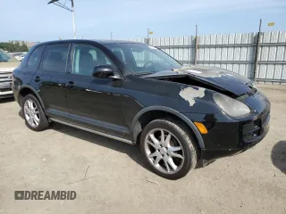 2005 Porsche Cayenne z VIN WP1AA29P65LA24059, wystawiony jako Copart lot #57484235 z przebiegiem Nie podano mil oraz Szkoda całkowita • Salvage title. Historia ofert i sprzedaży dostępna na DreamBid. Obrazek 4.