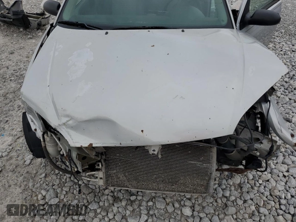 2007 Ford Focus S z VIN 1FAFP34N37W293421, wystawiony jako Copart lot #57833445 z przebiegiem 159 523 mil mil oraz Szkoda całkowita • Salvage title. Historia ofert i sprzedaży dostępna na DreamBid. Obrazek 11.
