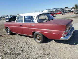 1966 Mercedes-Benz E with VIN 110C1012157487, listed as a Copart auction lot 81770344 with 68,662 mi miles and Salvage Title. Bid and sale history available at DreamBid. Image 2.