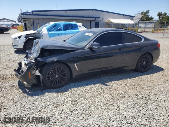 2014 BMW 4 Series 428i with VIN WBA3N3C57EF712370, listed as a Copart auction lot 63108215 with 151,779 mi miles and Salvage title. Bid and sale history available at DreamBid. Image 1.