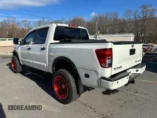 2015 Nissan Titan SL with VIN 1N6BA0EC7FN509763, listed as a Copart auction lot 88064785 with 168,916 mi miles and Clean Title. Bid and sale history available at carsss.com. Image 2.