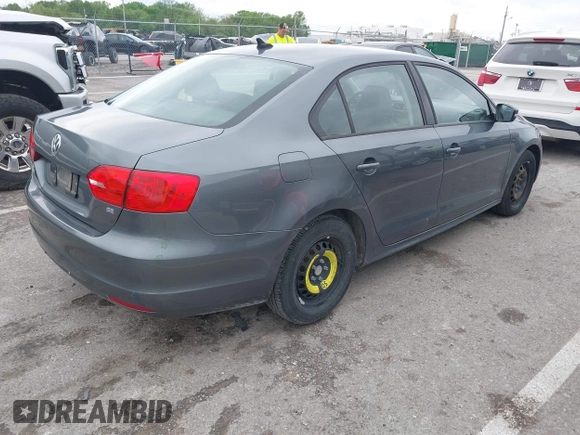 2014 Volkswagen Jetta SE z VIN 3VWD17AJ3EM225383, wystawiony jako IAAI lot #42172006 z przebiegiem 129 198 mil mil oraz . Historia ofert i sprzedaży dostępna na DreamBid. Obrazek 4.