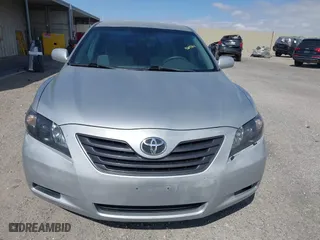 2007 Toyota Camry CE with VIN 4T1BE46K07U532647, listed as a IAAI auction lot 42075663 with 125,736 mi miles. Bid and sale history available at carsss.com. Image 6.