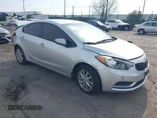 2014 Kia Forte LX with VIN KNAFX4A61E5081257, listed as a IAAI auction lot 42011042 with Not Provided miles and . Bid and sale history available at carsss.com. Image 1.