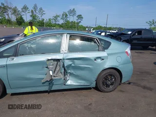 2014 Toyota Prius Four with VIN JTDKN3DUXE1852835, listed as a IAAI auction lot 42234128 with 189,512 mi miles and . Bid and sale history available at DreamBid. Image 6.