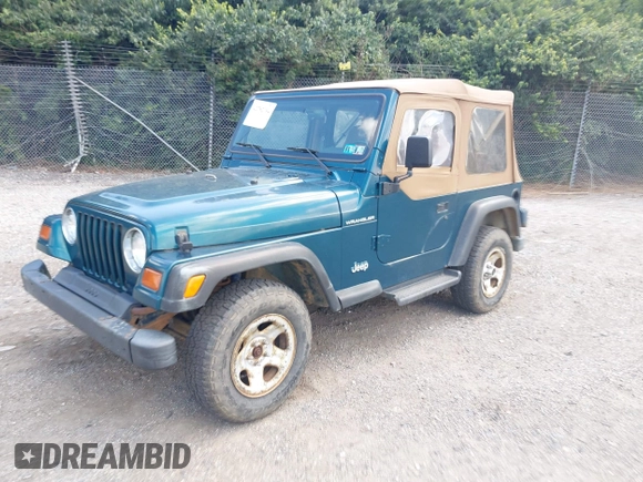 1997 Jeep Wrangler SE with VIN 1J4FY29P2VP446769, listed as a IAAI auction lot 42782194 with 98,352 mi miles and . Bid and sale history available at DreamBid. Image 2.