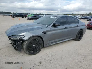 2023 BMW M5 with VIN WBS83CH08PCL64216, listed as a Copart auction lot 86611734 with 4,951 mi miles and Clean Title. Bid and sale history available at carsss.com. Image 1.