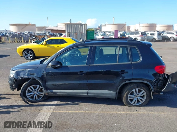 2015 Volkswagen Tiguan S z VIN WVGAV7AX8FW615777, wystawiony jako IAAI lot #42165193 z przebiegiem Nie podano mil oraz . Historia ofert i sprzedaży dostępna na DreamBid. Obrazek 14.
