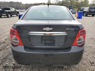 2013 Chevrolet Sonic LT with VIN 1G1JC5SH1D4221495, listed as a Copart auction lot 48190305 with 129,437 mi miles and Salvage Title. Bid and sale history available at carsss.com. Image 6.
