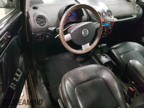 2009 Volkswagen Beetle S with VIN 3VWRG31Y49M406783, listed as a Copart auction lot 75182044 with 57,113 mi miles and Salvage title. Bid and sale history available at DreamBid. Image 8.