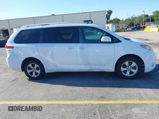 2012 Toyota Sienna with VIN 5TDKA3DC5CS011220, listed as a IAAI auction lot 41770493 with 199,266 mi miles and . Bid and sale history available at DreamBid. Image 13.