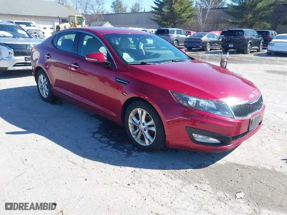 2013 Kia Optima LX with VIN 5XXGM4A78DG205737, listed as a IAAI auction lot 42005695 with 104,784 mi miles. Bid and sale history available at carsss.com. Image 1.