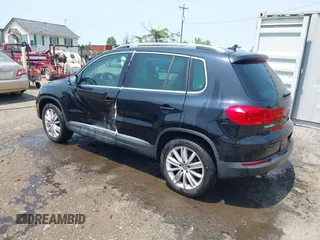 2012 Volkswagen Tiguan SE z VIN WVGBV7AX1CW548133, wystawiony jako IAAI lot #42403164 z przebiegiem 139 083 mil mil oraz . Historia ofert i sprzedaży dostępna na DreamBid. Obrazek 3.