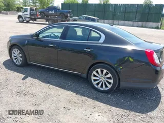 2013 Lincoln MKS with VIN 1LNHL9DKXDG601595, listed as a IAAI auction lot 42239041 with 224,537 mi miles and . Bid and sale history available at DreamBid. Image 3.