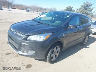 2016 Ford Escape SE with VIN 1FMCU9GX9GUC37108, listed as a IAAI auction lot 41543684 with 116,827 mi miles. Bid and sale history available at carsss.com. Image 2.