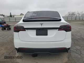 2023 Tesla Model X with VIN 7SAXCAE58PF379943, listed as a Copart auction lot 86352354 with Not Provided miles and Salvage Title. Bid and sale history available at DreamBid. Image 6.