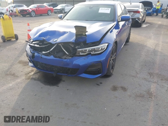 2019 BMW 3 Series 330i xDrive with VIN WBA5R7C50KAE82705, listed as a IAAI auction lot 41233898 with 69,505 mi miles. Bid and sale history available at carsss.com. Image 6.