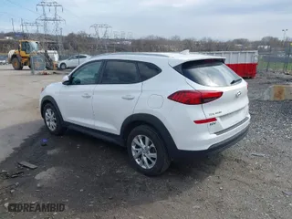 2019 Hyundai Tucson Value with VIN KM8J3CA42KU013032, listed as a IAAI auction lot 41880465 with 51,332 mi miles. Bid and sale history available at carsss.com. Image 3.