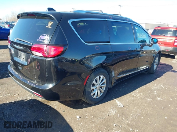 2018 Chrysler Pacifica Touring L with VIN 2C4RC1BGXJR157184, listed as a IAAI auction lot 41803388 with 102,095 mi miles and . Bid and sale history available at DreamBid. Image 4.