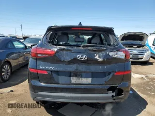 2019 Hyundai Tucson Value with VIN KM8J33A43KU888877, listed as a Copart auction lot 52191305 with 77,204 mi miles and Salvage title. Bid and sale history available at DreamBid. Image 6.