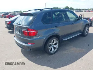 2012 BMW X5 35d with VIN 5UXZW0C56CL664575, listed as a IAAI auction lot 42559674 with 157,554 mi miles and . Bid and sale history available at DreamBid. Image 4.