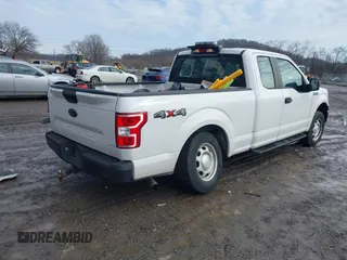 2019 Ford F-150 XL with VIN 1FTFX1E52KKD85097, listed as a IAAI auction lot 41479169 with 96,713 mi miles and . Bid and sale history available at DreamBid. Image 4.