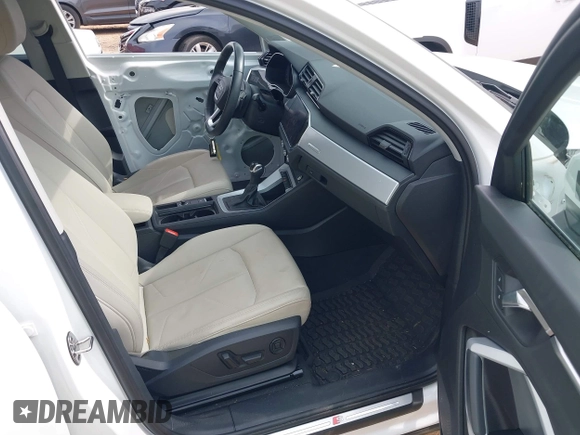 2021 Audi Q3 S line Premium with VIN WA1DECF37M1037711, listed as a IAAI auction lot 42096937 with 28,973 mi miles and . Bid and sale history available at DreamBid. Image 5.
