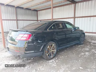 2016 Ford Taurus SHO z VIN 1FAHP2KT4GG140903, wystawiony jako IAAI lot #42415173 z przebiegiem 141 392 mil mil oraz . Historia ofert i sprzedaży dostępna na DreamBid. Obrazek 4.