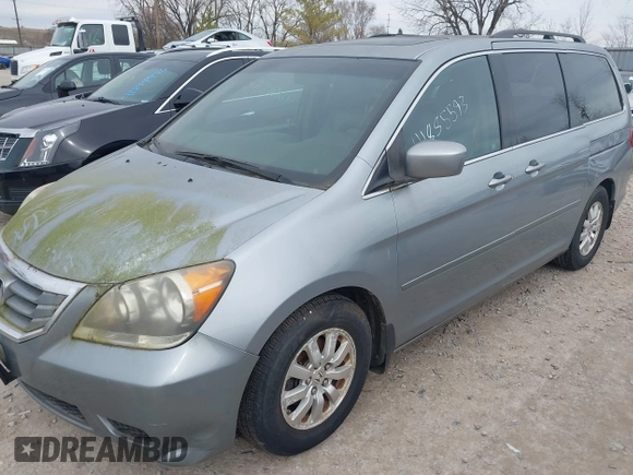2008 Honda Odyssey EX-L with VIN 5FNRL38748B045957, listed as a IAAI auction lot 41885593 with 212,799 mi miles. Bid and sale history available at carsss.com. Image 2.
