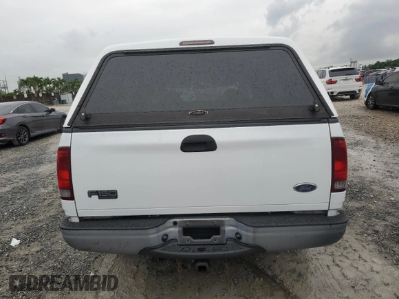 2004 Ford F-150 XL z VIN 2FTRX172X4CA49253, wystawiony jako Copart lot #63192915 z przebiegiem 372 644 mil mil oraz Szkoda całkowita • Salvage title. Historia ofert i sprzedaży dostępna na DreamBid. Obrazek 6.