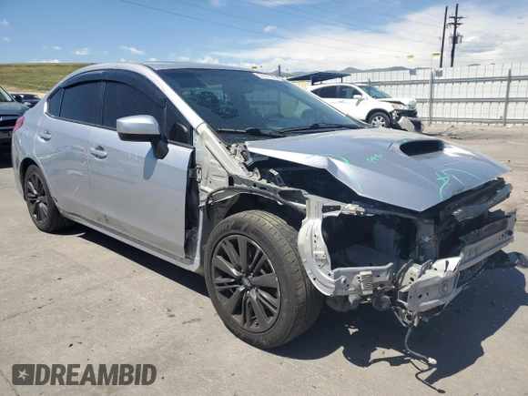 2015 Subaru WRX Premium z VIN JF1VA1F60F9822800, wystawiony jako Copart lot #57797145 z przebiegiem 154 251 mil mil oraz Szkoda całkowita • Salvage title. Historia ofert i sprzedaży dostępna na DreamBid. Obrazek 4.