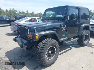 2005 Jeep Wrangler X z VIN 1J4FA39S45P382880, wystawiony jako IAAI lot #42129610 z przebiegiem 191 864 mil mil oraz . Historia ofert i sprzedaży dostępna na DreamBid. Obrazek 18.