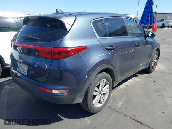 2019 Kia Sportage LX with VIN KNDPM3ACXK7513831, listed as a IAAI auction lot 41969252 with 99,388 mi miles. Bid and sale history available at carsss.com. Image 4.