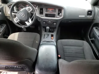 2013 Dodge Charger SE z VIN 2C3CDXBG7DH537104, wystawiony jako Copart lot #57049005 z przebiegiem 168 618 mil mil oraz Szkody całkowita. Historia ofert i sprzedaży dostępna na DreamBid. Obrazek 8.