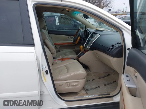 2007 Lexus RX 400h with VIN JTJGW31U572004833, listed as a IAAI auction lot 41938575 with 221,084 mi miles and . Bid and sale history available at DreamBid. Image 5.
