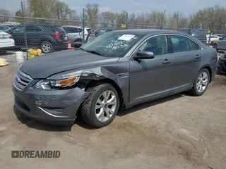 2012 Ford Taurus SEL z VIN 1FAHP2EWXCG138038, wystawiony jako IAAI lot #42007614 z przebiegiem 155 045 mil mil oraz . Historia ofert i sprzedaży dostępna na DreamBid. Obrazek 2.