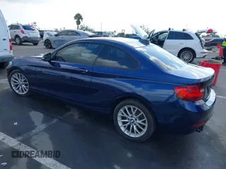 2016 BMW 2 Series 228i with VIN WBA1F9C55GV545295, listed as a IAAI auction lot 41539525 with 147,604 mi miles. Bid and sale history available at carsss.com. Image 3.