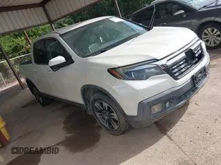 2017 Honda Ridgeline RTL-T with VIN 5FPYK2F67HB004457, listed as a IAAI auction lot 42650294 with 44,046 mi miles and . Bid and sale history available at DreamBid. Image 1.