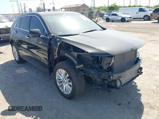 2024 Cadillac XT4 FWD Luxury z VIN 1GYAZAR41RF247456, wystawiony jako IAAI lot #42005721 z przebiegiem 14 069 mil mil oraz . Historia ofert i sprzedaży dostępna na DreamBid. Obrazek 1.