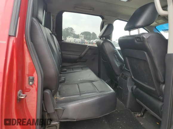 2012 Nissan Titan SV with VIN 1N6BA0EK4CN319941, listed as a Copart auction lot 43640705 with 210,885 mi miles and Salvage Title. Bid and sale history available at DreamBid. Image 10.