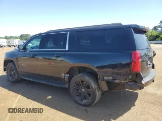 2019 Chevrolet Suburban LS with VIN 1GNSCGECXKR208615, listed as a Copart auction lot 52187105 with 174,105 mi miles and Salvage title. Bid and sale history available at DreamBid. Image 2.